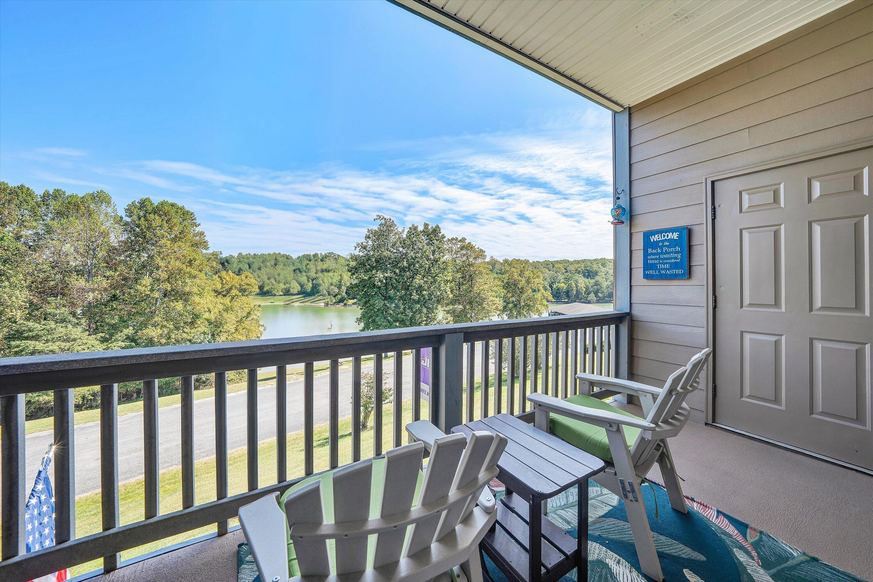 1175 Mariners Way, Unit 54 Huddleston, VA 24104 - Photo 17 of 37 a view of a chair and table in the balcony