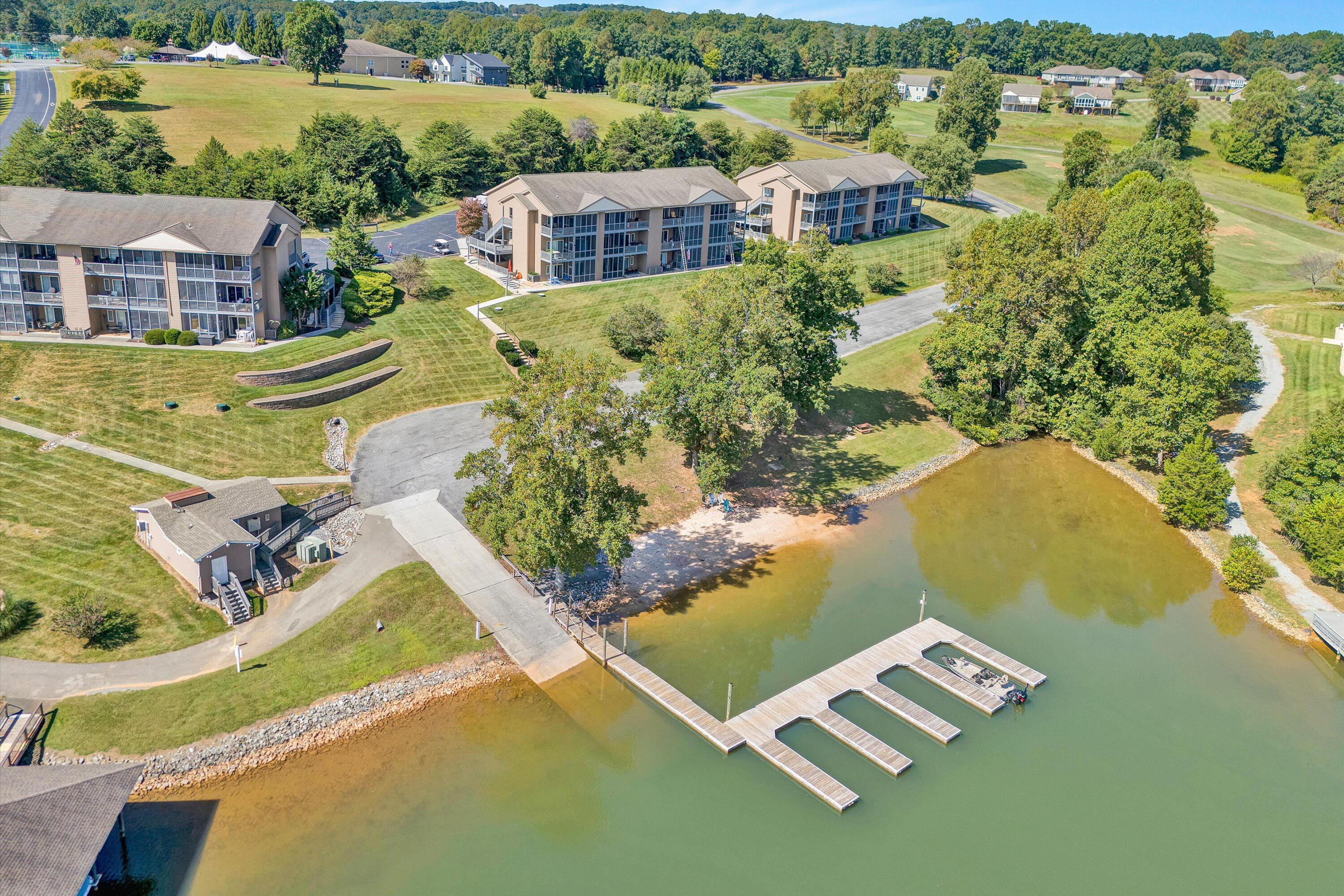 1175 Mariners Way, Unit 54 Huddleston, VA 24104 - Photo 2 of 37 an aerial view of residential house with outdoor space and lake view