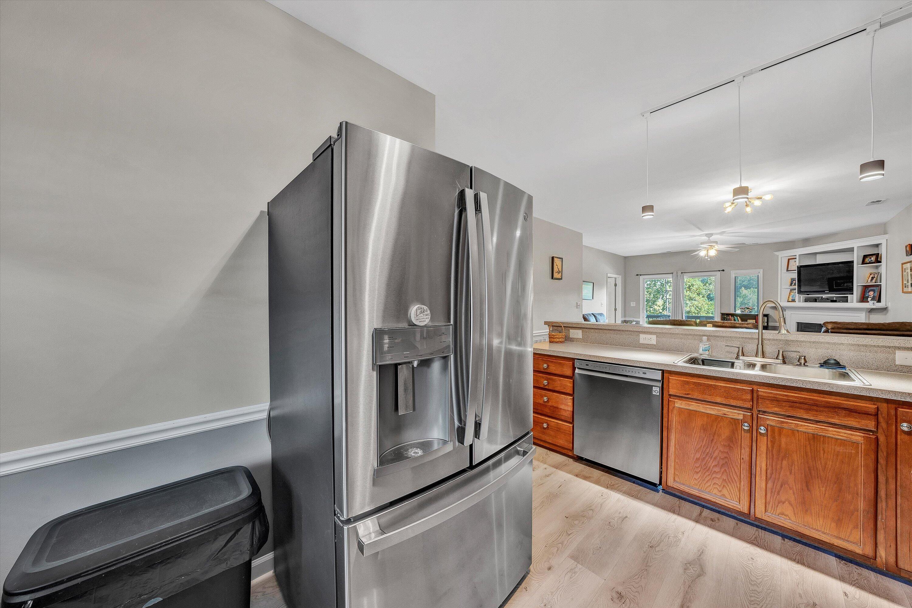 1175 Mariners Way, Unit 54 Huddleston, VA 24104 - Photo 22 of 37 a kitchen with stainless steel appliances a refrigerator and a sink
