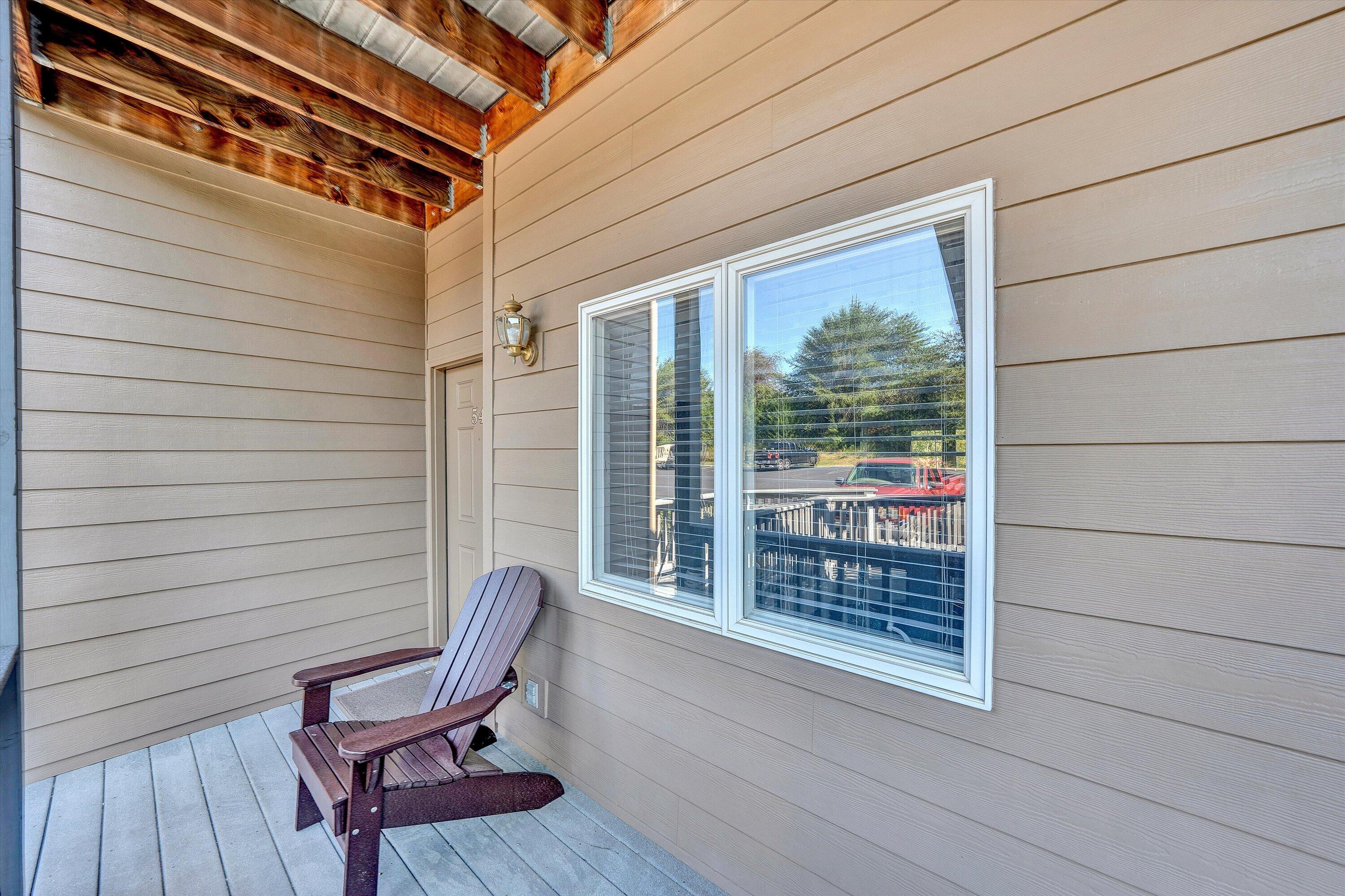 1175 Mariners Way, Unit 54 Huddleston, VA 24104 - Photo 24 of 37 a view of a two chairs in the balcony