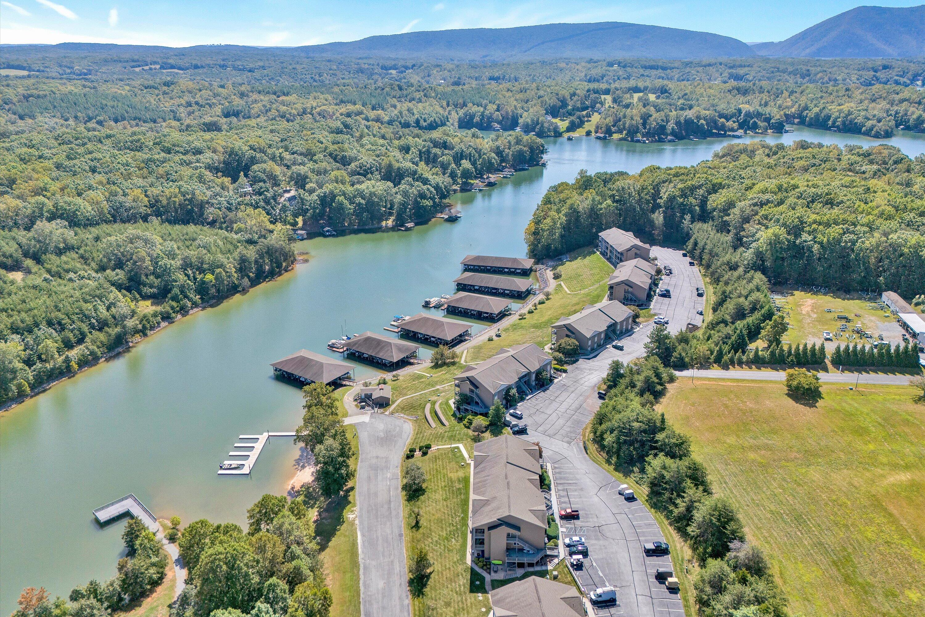 1175 Mariners Way, Unit 54 Huddleston, VA 24104 - Photo 27 of 37 an aerial view of a house with outdoor space and a lake view