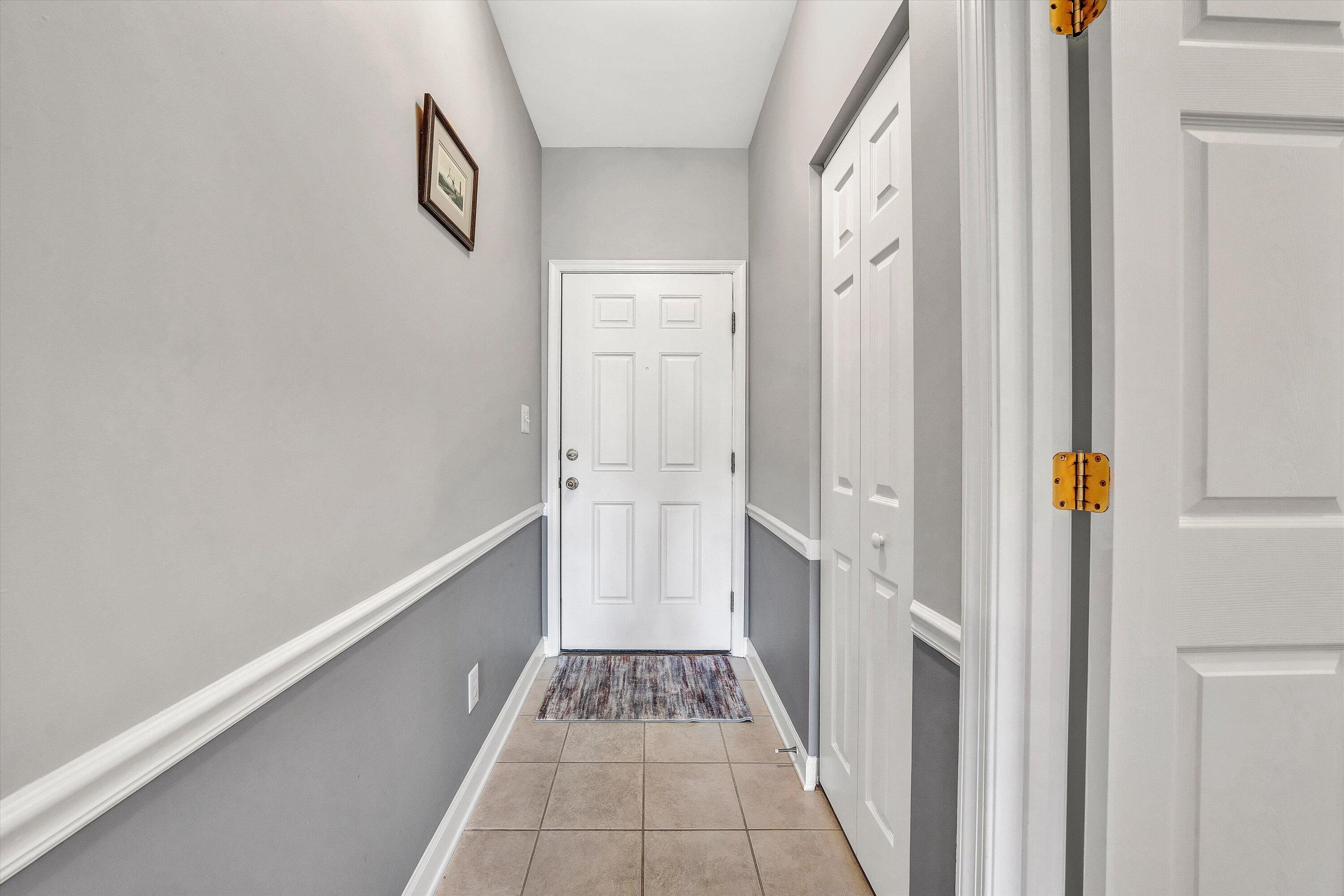 1175 Mariners Way, Unit 54 Huddleston, VA 24104 - Photo 3 of 37 a view of a hallway with wooden floor and staircase