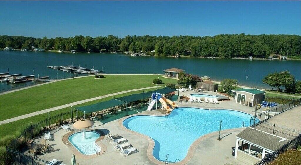 1175 Mariners Way, Unit 54 Huddleston, VA 24104 - Photo 31 of 37 an aerial view of a house with outdoor space swimming pool and lake view