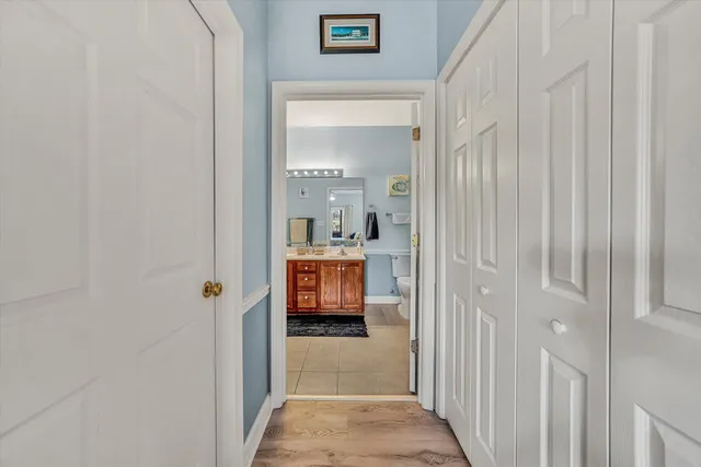 a view of a bathroom from the hallway