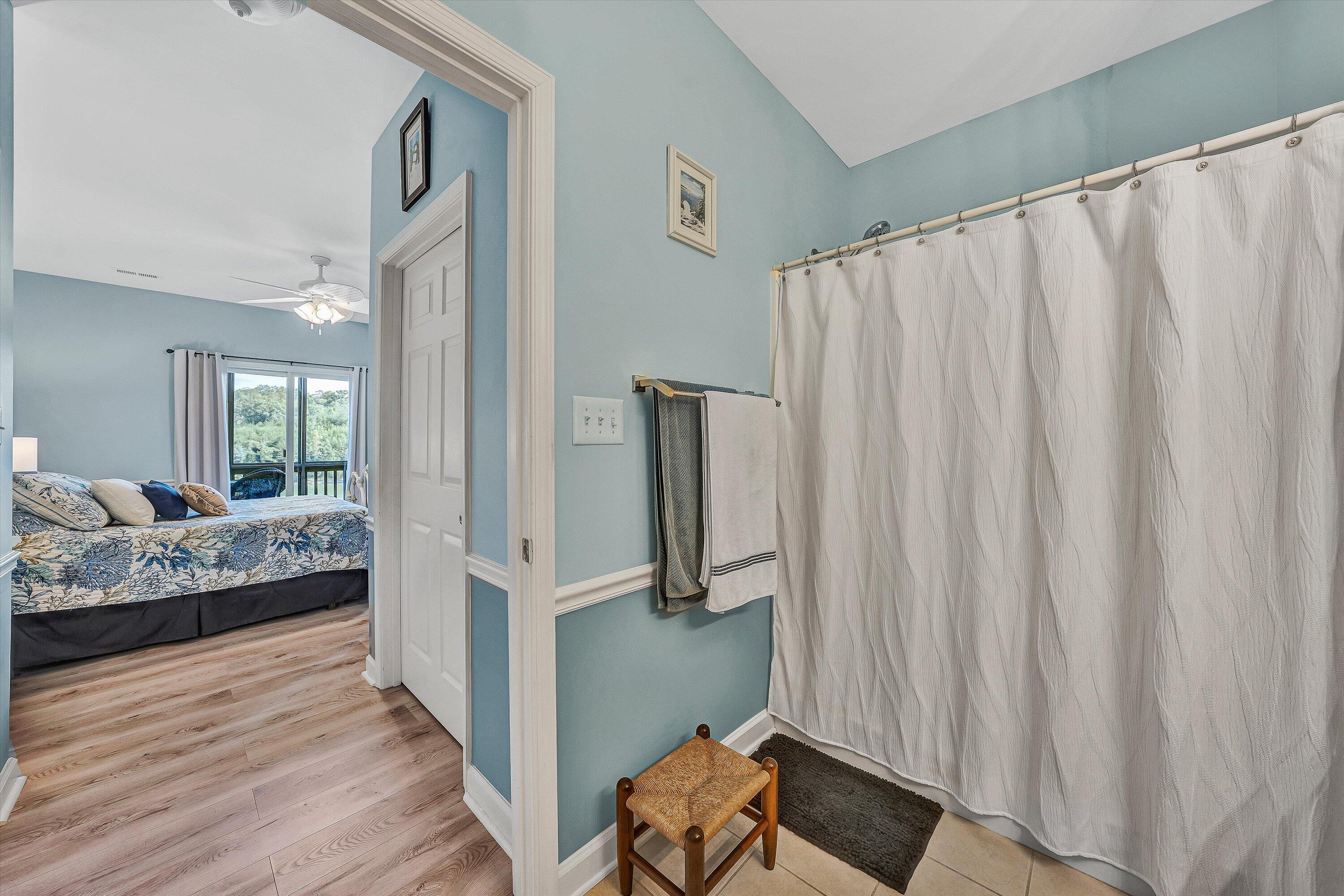 1175 Mariners Way, Unit 54 Huddleston, VA 24104 - Photo 8 of 37 a view of a bedroom with furniture and window