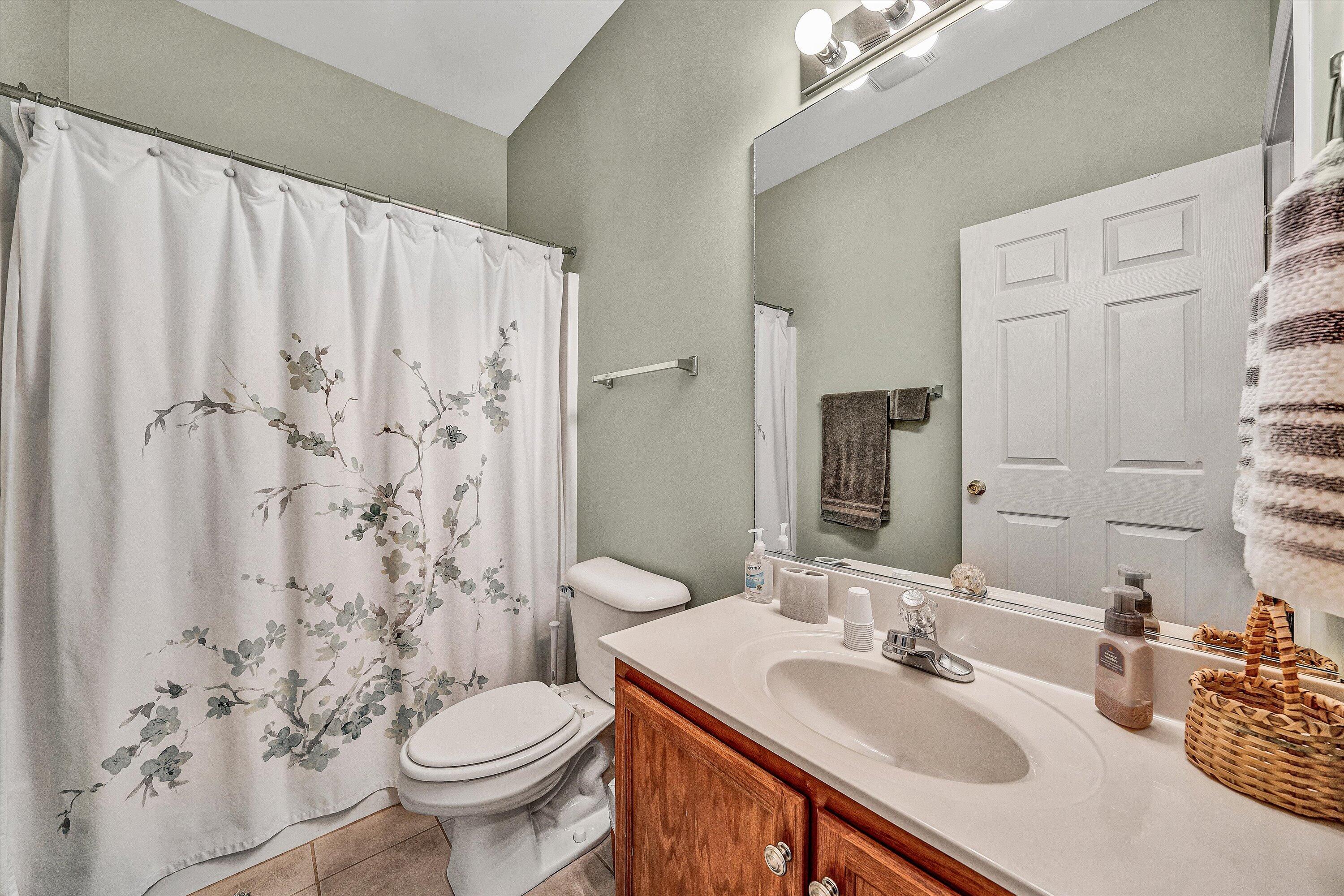 1175 Mariners Way, Unit 54 Huddleston, VA 24104 - Photo 10 of 37 a bathroom with a sink toilet and shower