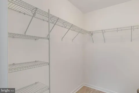 a view of a kitchen with a sink and cabinets