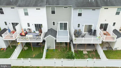 a view of a street with a building in the background
