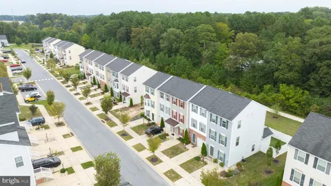 a view of a living room with lots of gym equipment