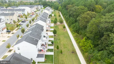 a view of a lake with houses in the background