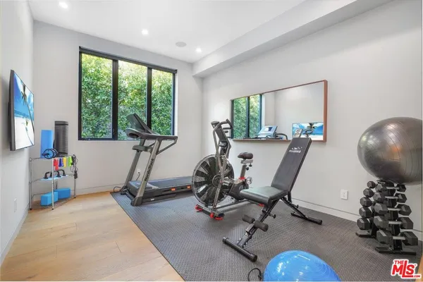a view of a room with gym equipment