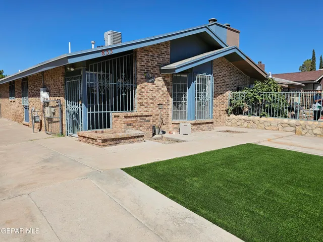 a view of houses with a swimming pool