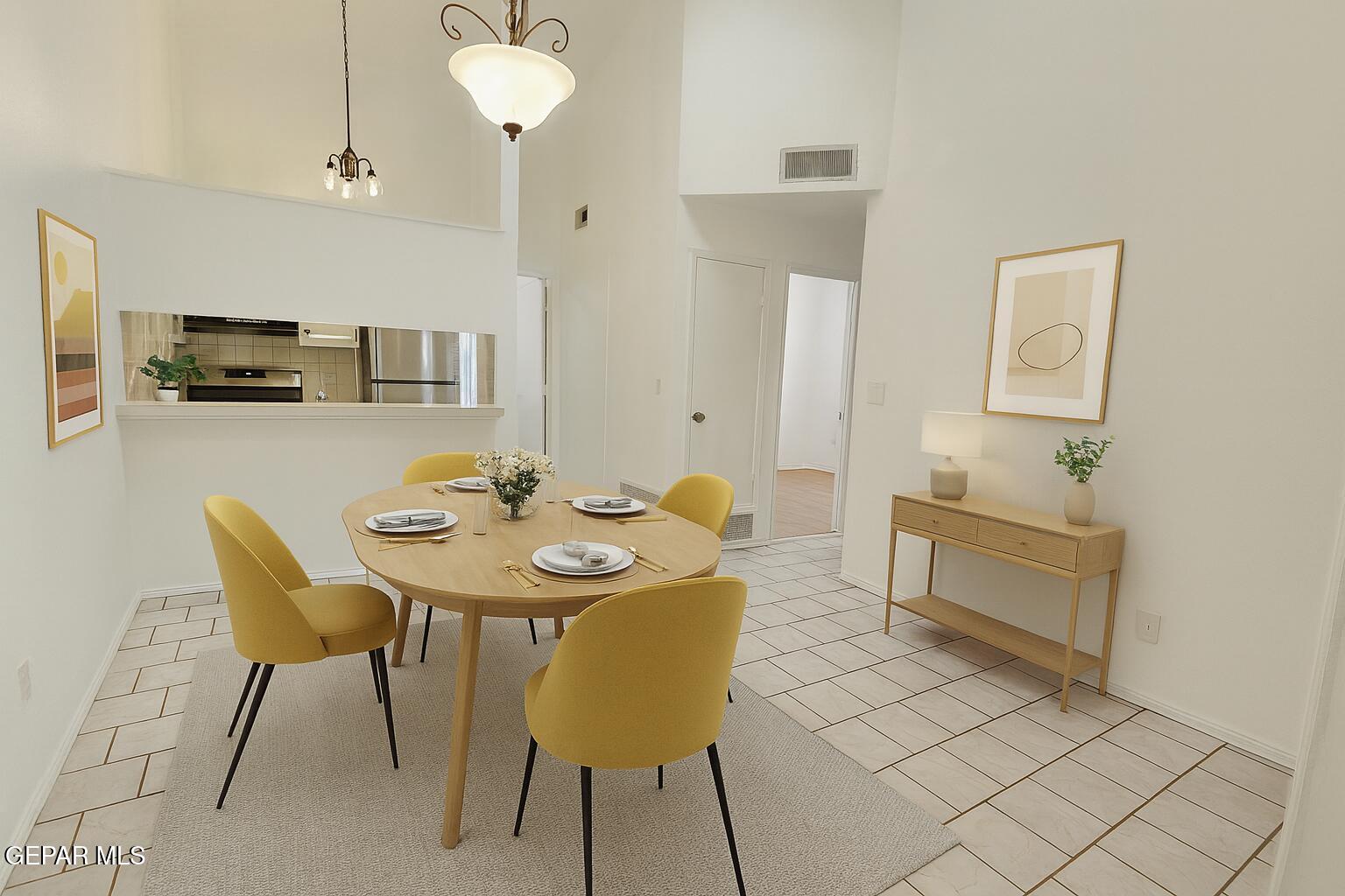 833 Destello Road El Paso, TX 79907 - Photo 11 of 55 a view of a dining room with furniture and a chandelier