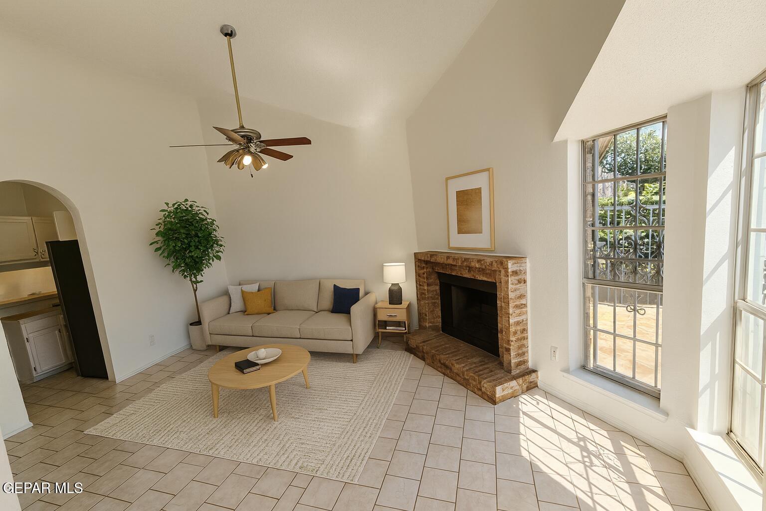 833 Destello Road El Paso, TX 79907 - Photo 10 of 55 a living room with furniture and a fireplace