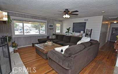 21825 Thunderbird Road Apple Valley, CA 92307 - Photo 5 of 22 a living room with furniture and a large window