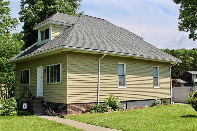 1308 Powers Run Road Pittsburgh, PA 15238 - Photo 4 of 25 Side View With Freshly Painted Base Of Home and New Railing On Front Porch