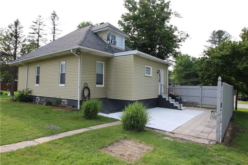 1308 Powers Run Road Pittsburgh, PA 15238 - Photo 5 of 25 Rear View Of Home With Patio and New Railing On Back Steps