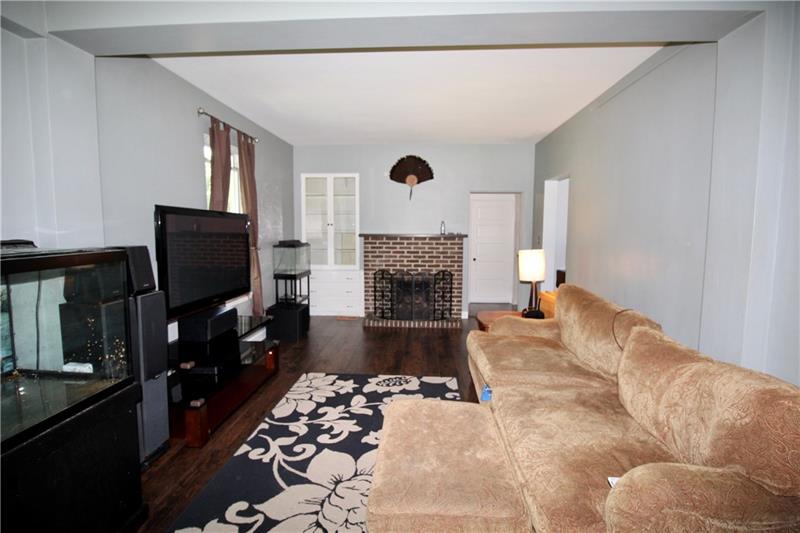 1308 Powers Run Road Pittsburgh, PA 15238 - Photo 10 of 25 Living Room With Wood Burning Fireplace