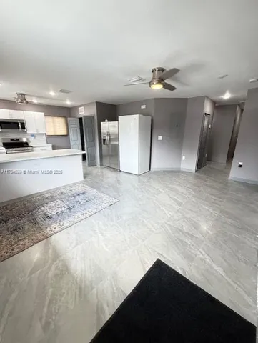 a view of a kitchen with a sink and dishwasher kitchen view
