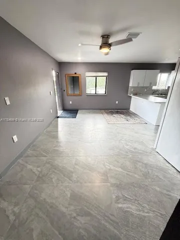 a view of empty room with a window