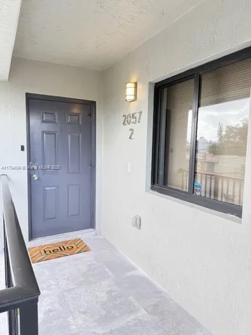 view of an empty room with a window