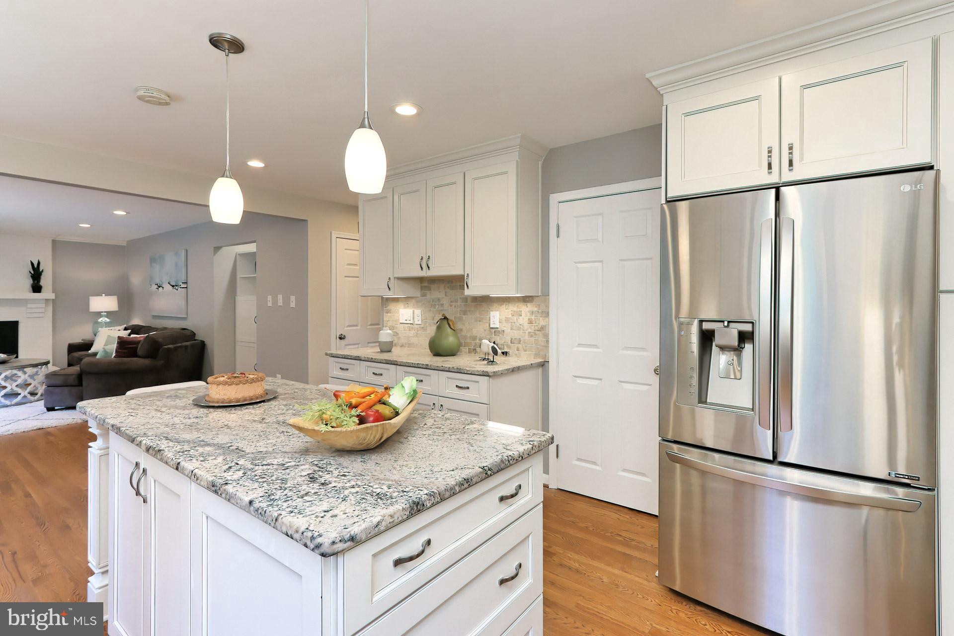 7004 Maple Tree Lane Springfield, VA 22152 - Photo 11 of 58 Stainless appls including a French door fridge