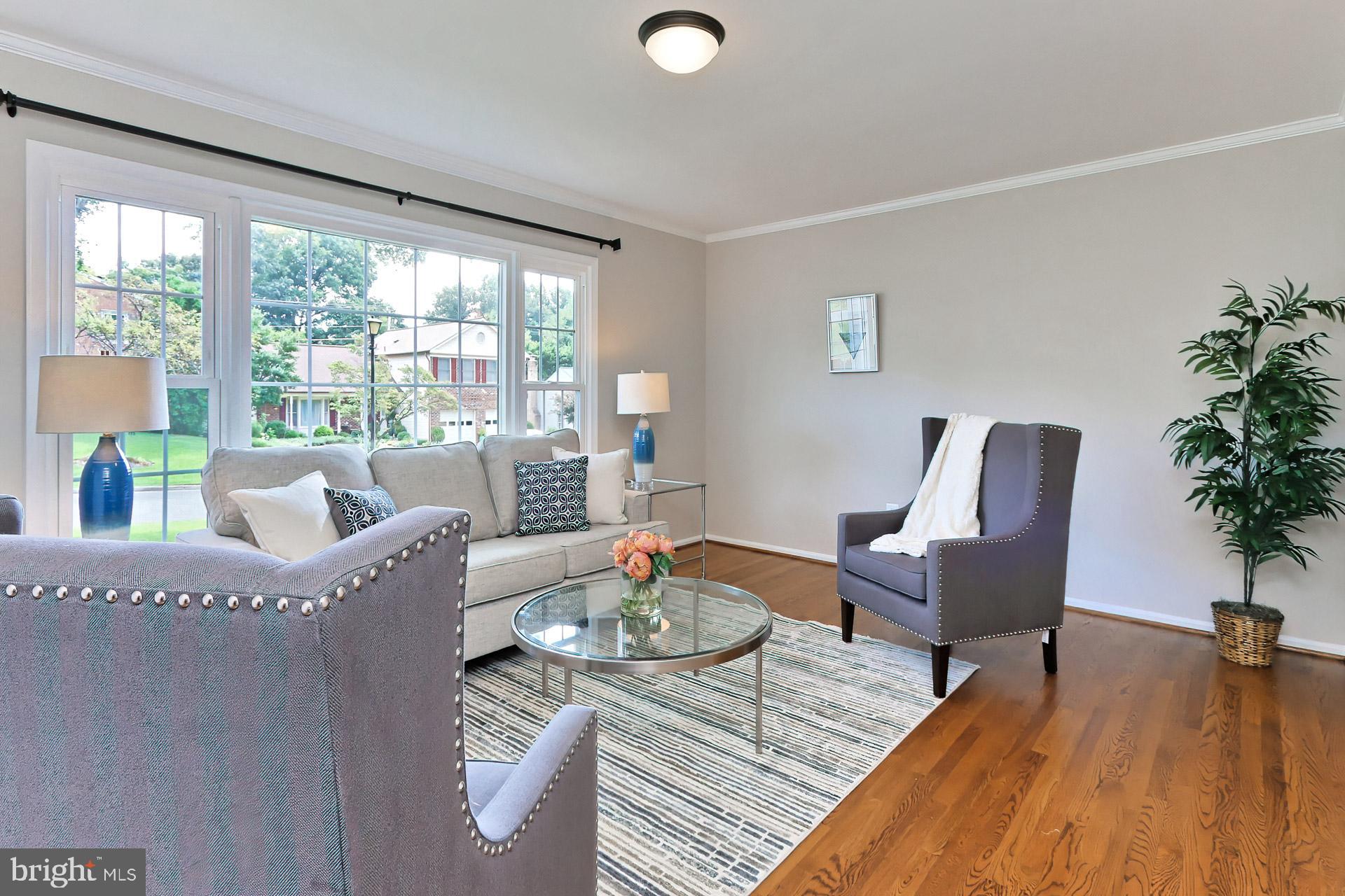 7004 Maple Tree Lane Springfield, VA 22152 - Photo 15 of 58 Gleaming hardwood floors & crown molding