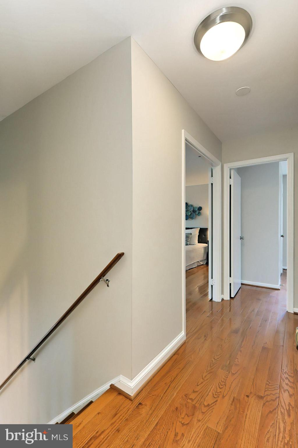7004 Maple Tree Lane Springfield, VA 22152 - Photo 26 of 58 Upper hallway. Newer hardwoods thruout upper level