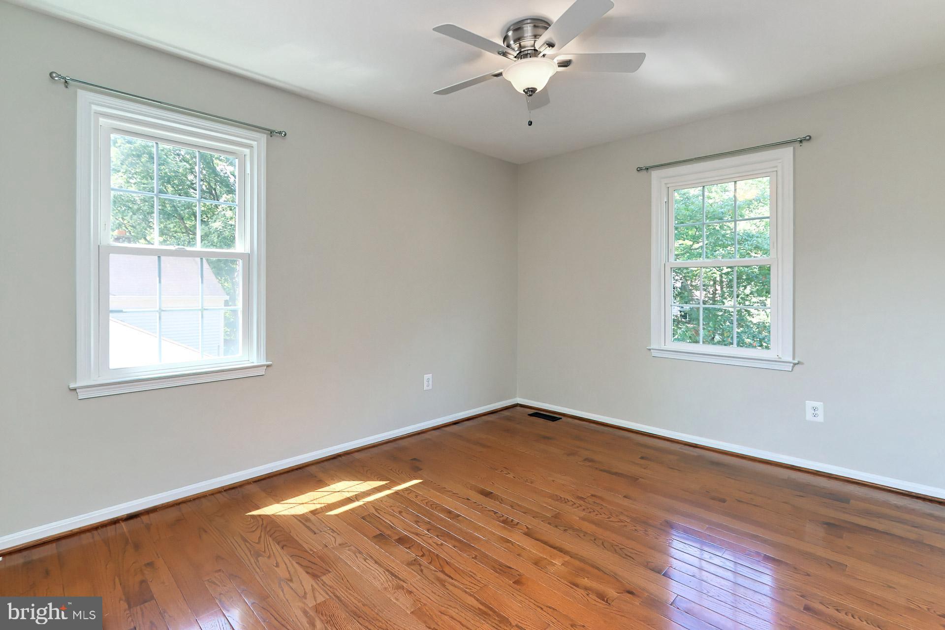 7004 Maple Tree Lane Springfield, VA 22152 - Photo 31 of 58 Bedroom 2 with ceiling fan/light, upper level