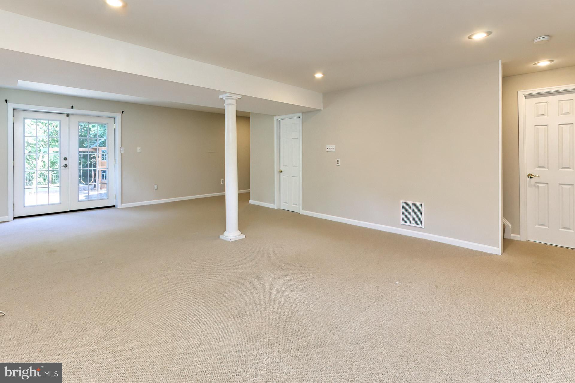 7004 Maple Tree Lane Springfield, VA 22152 - Photo 38 of 58 French doors walk out to slate patio