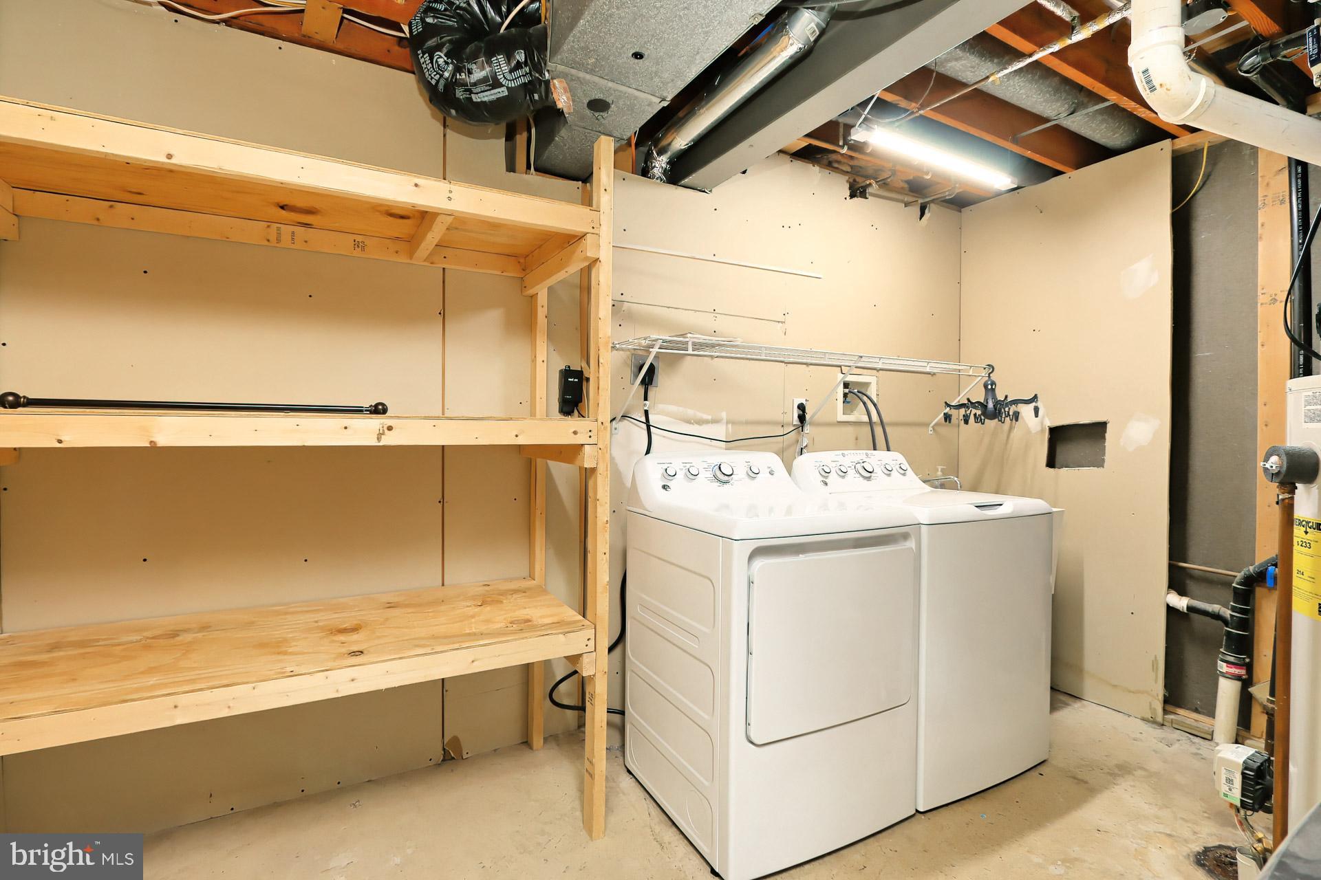 7004 Maple Tree Lane Springfield, VA 22152 - Photo 43 of 58 Laundry area, storage shelves