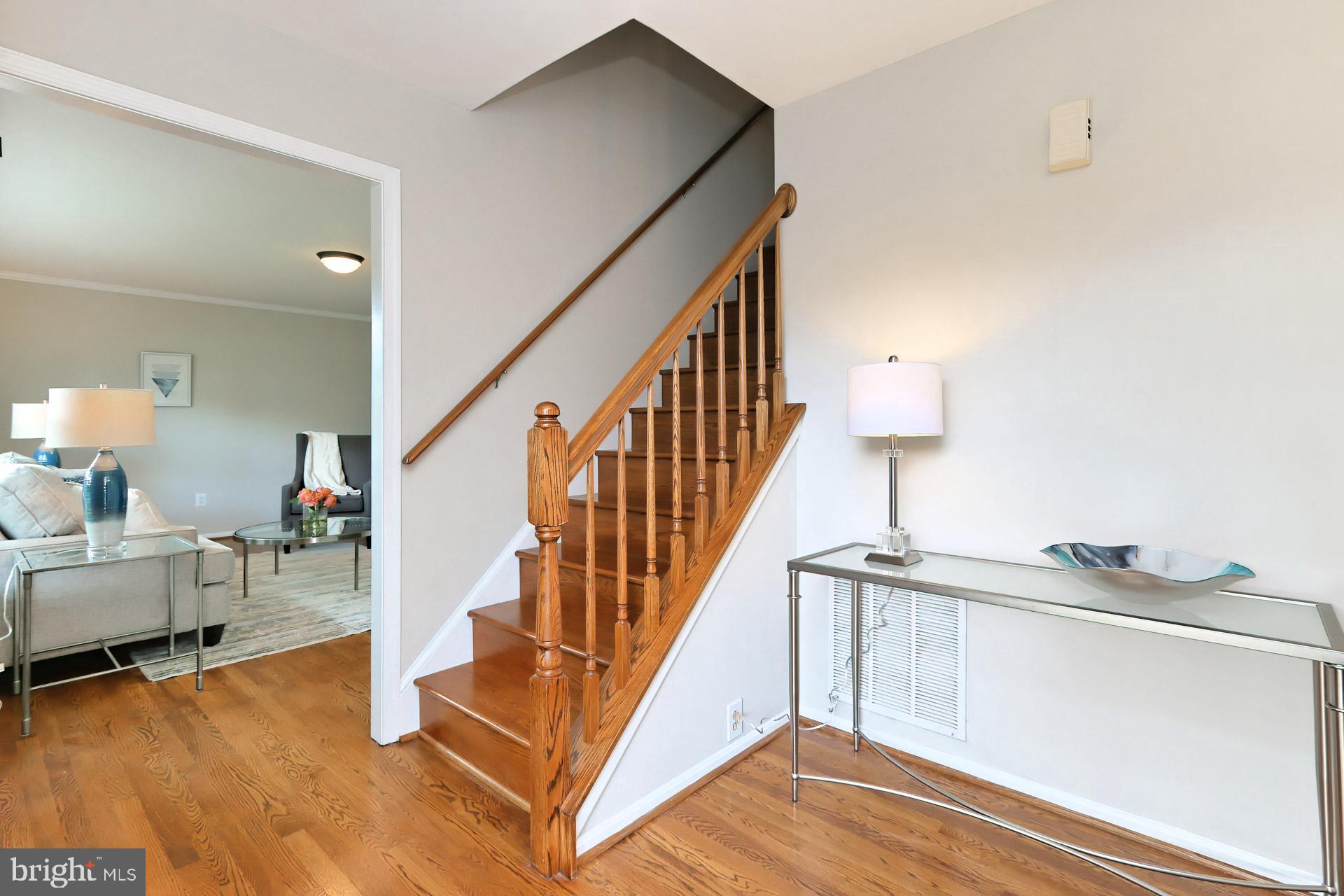 7004 Maple Tree Lane Springfield, VA 22152 - Photo 6 of 58 Foyer with hardwood floors