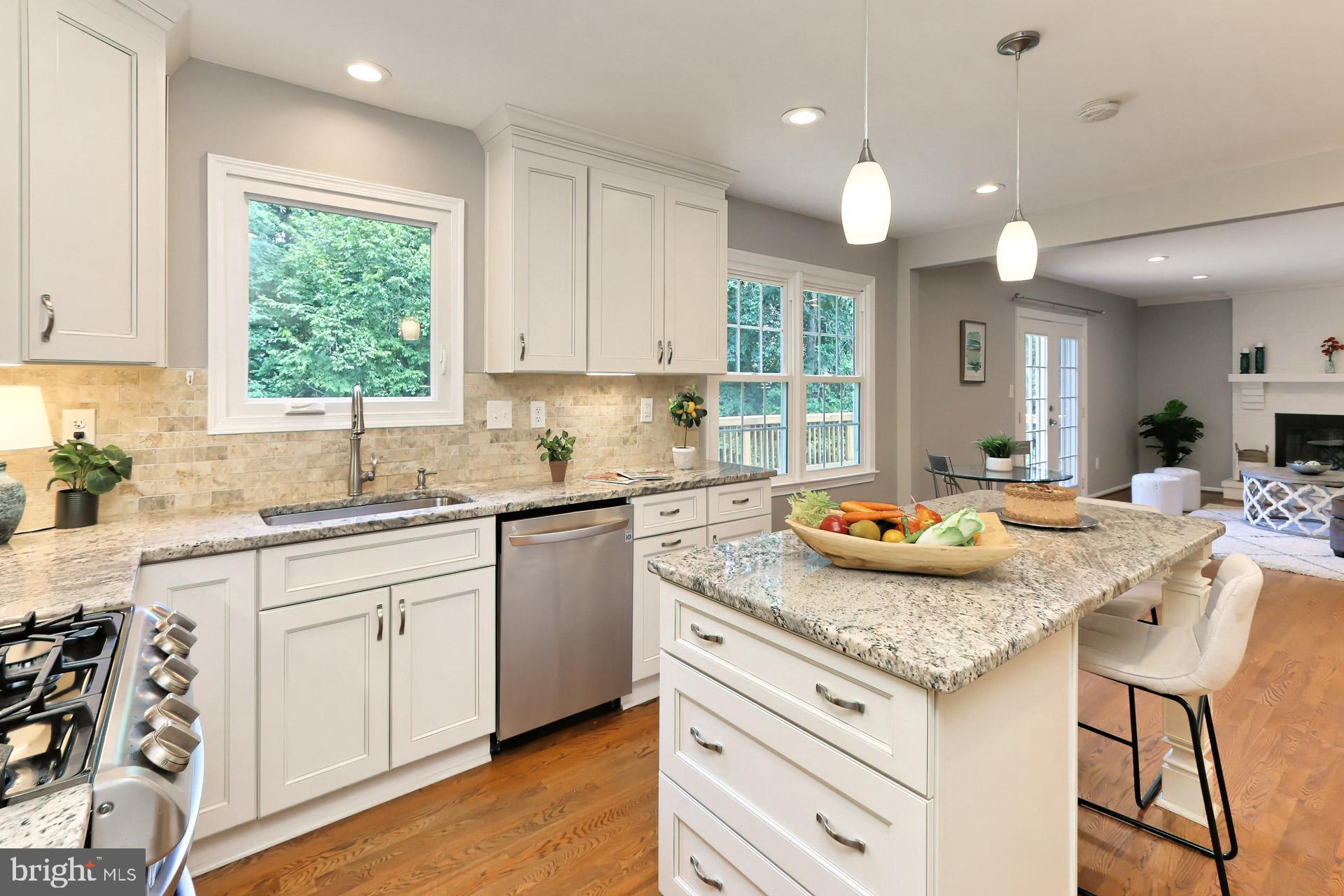 7004 Maple Tree Lane Springfield, VA 22152 - Photo 9 of 58 Ceramic tile backsplash & under cabinet lighting