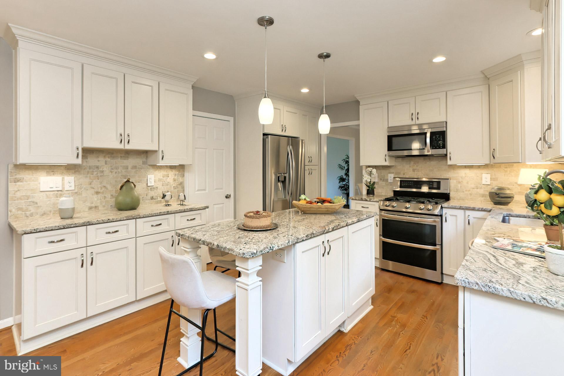 7004 Maple Tree Lane Springfield, VA 22152 - Photo 10 of 58 Hardwood floors and recessed lighting