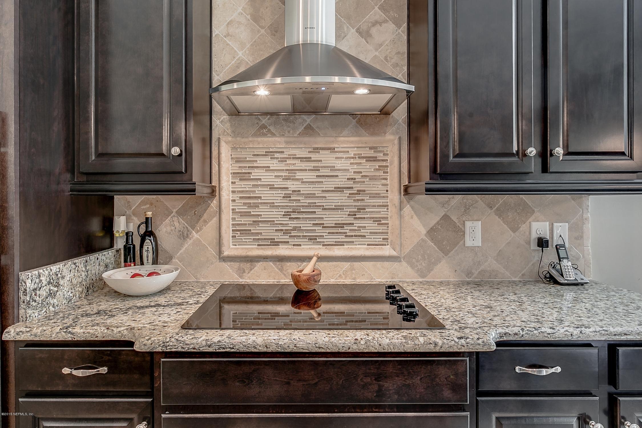 1808 Sugar Maple Road Fleming Island, FL 32003 - Photo 11 of 19 Electric_Range_and_Tile_Backsplash