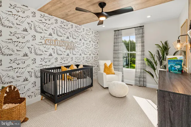 a bedroom with a bed mirror and a large window