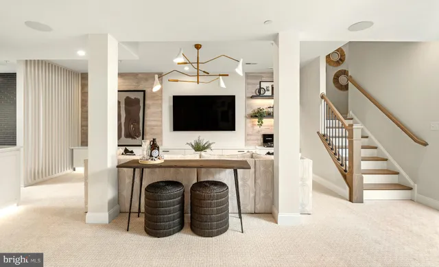 a bathroom with a sink a toilet and a shower