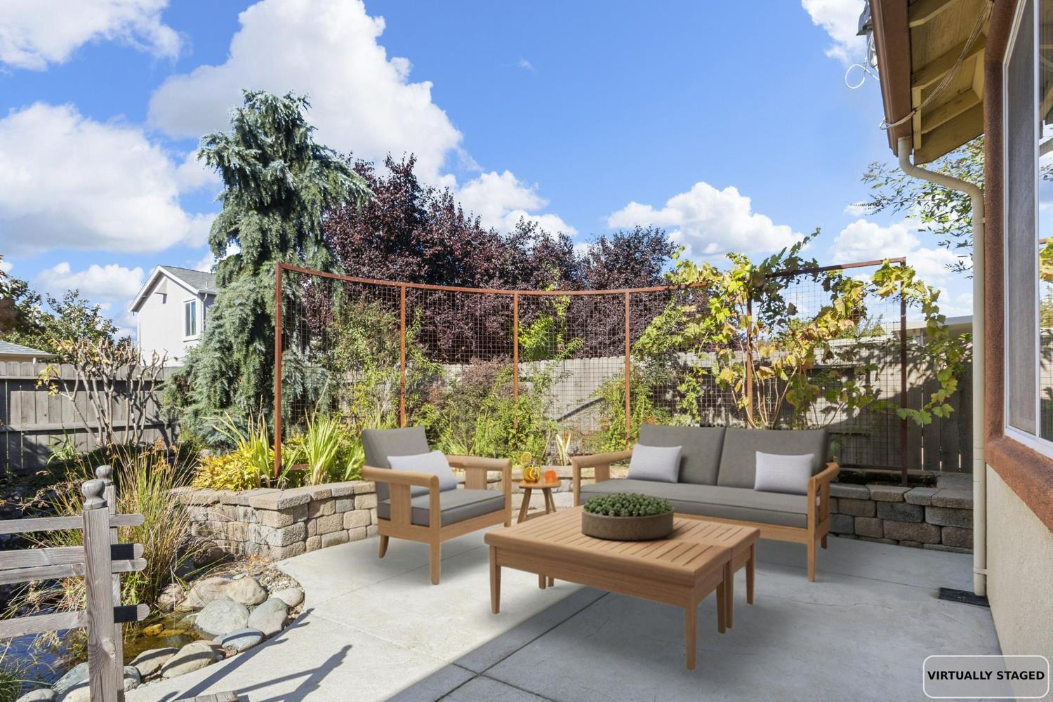 3451 Rainhill Loop Roseville, CA 95747 - Photo 29 of 40 a outdoor living space with furniture and a potted plant
