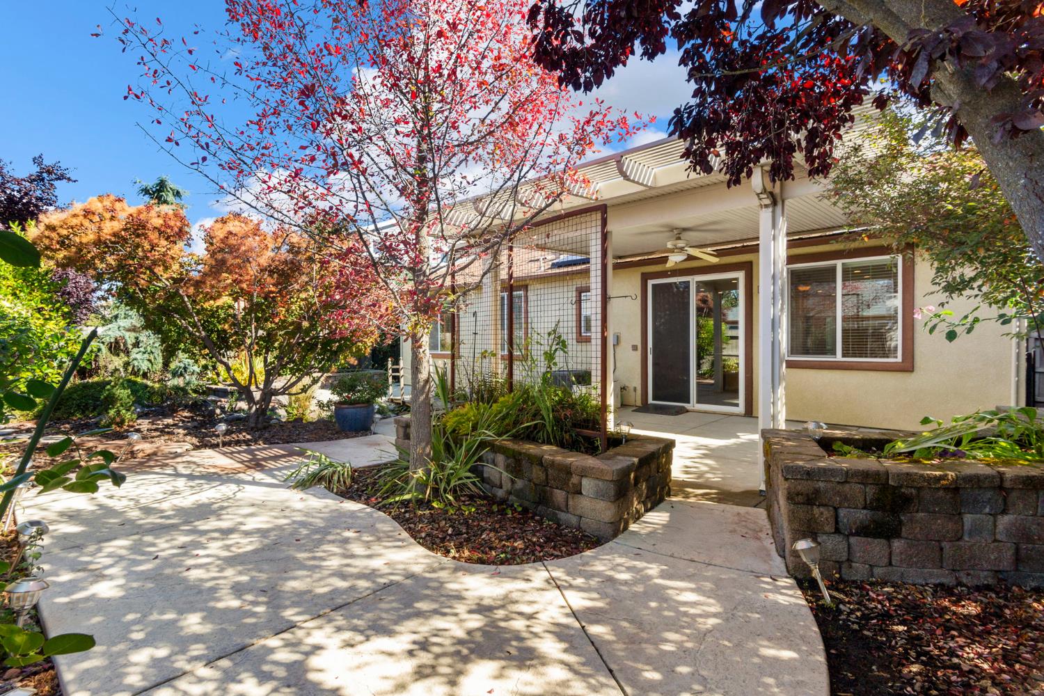 3451 Rainhill Loop Roseville, CA 95747 - Photo 30 of 40 a view of a house with backyard and sitting area