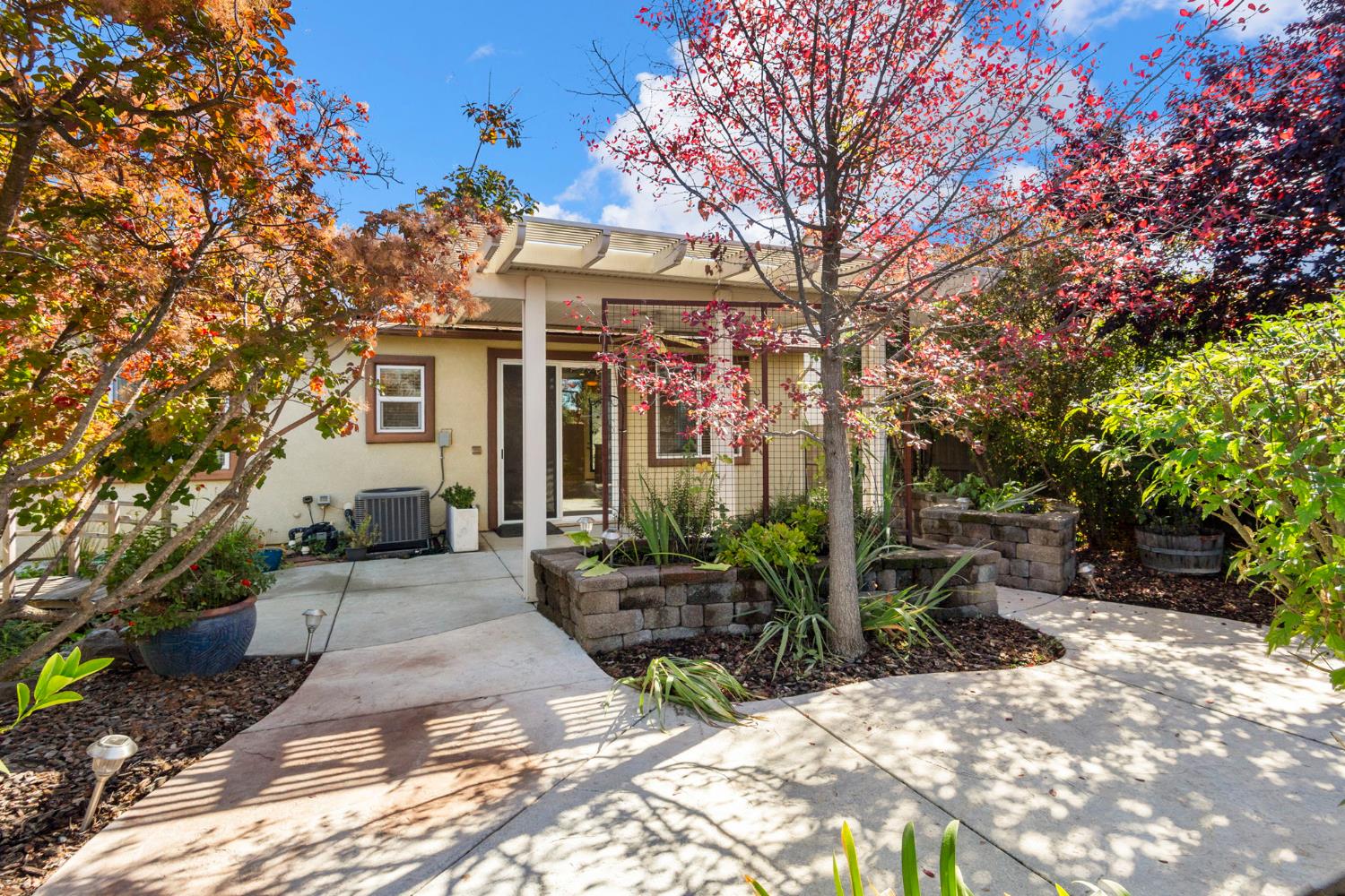 3451 Rainhill Loop Roseville, CA 95747 - Photo 31 of 40 a view of a chairs and table in backyard