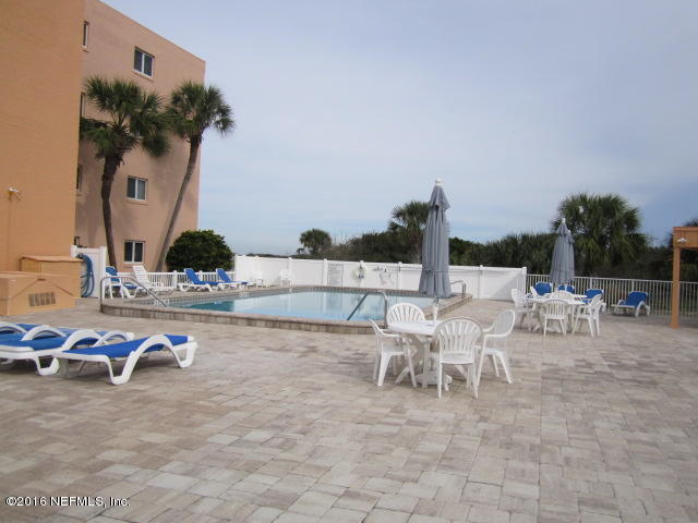 4 Ocean Trace Road, Unit 422 St. Augustine, FL 32080 - Photo 33 of 33 a view of a terrace with chairs