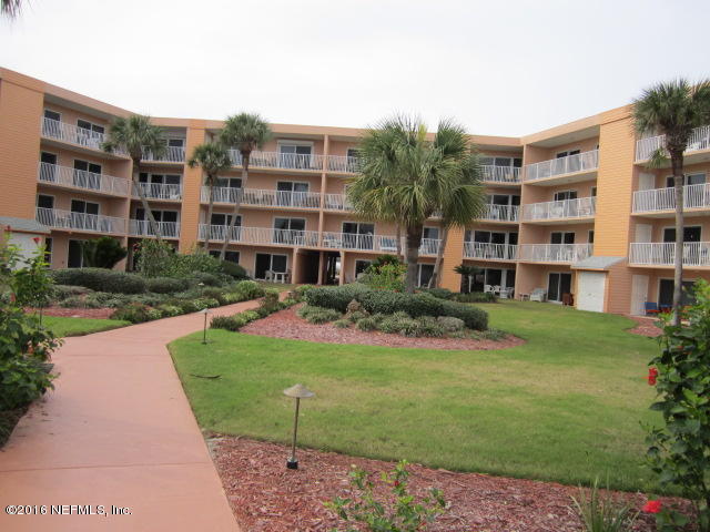 4 Ocean Trace Road, Unit 422 St. Augustine, FL 32080 - Photo 4 of 33 a view of a building with garden