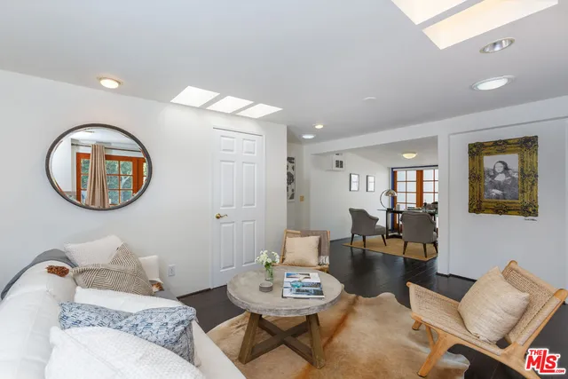 a view of a house with swimming pool and a porch