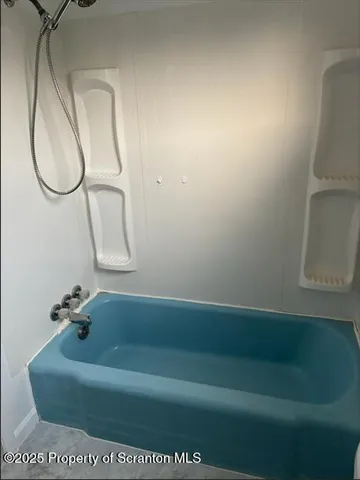 a bathroom with a bathtub