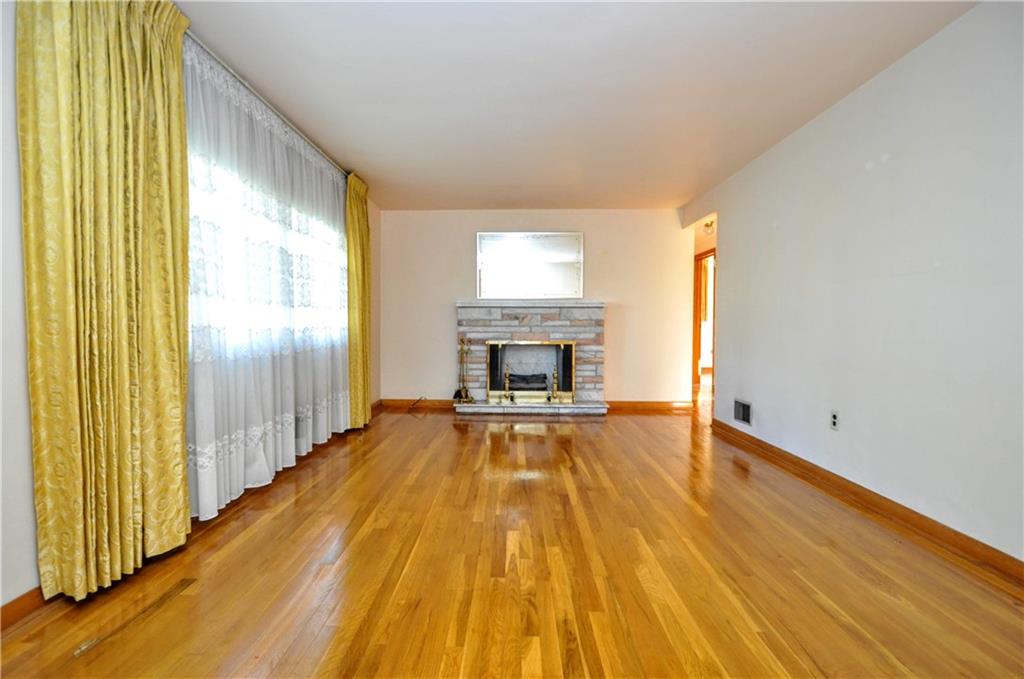 5262 McAnulty Road Pittsburgh, PA 15236 - Photo 5 of 23 Main Living Room W/Uncovered Hardwoods In Excellent Condition