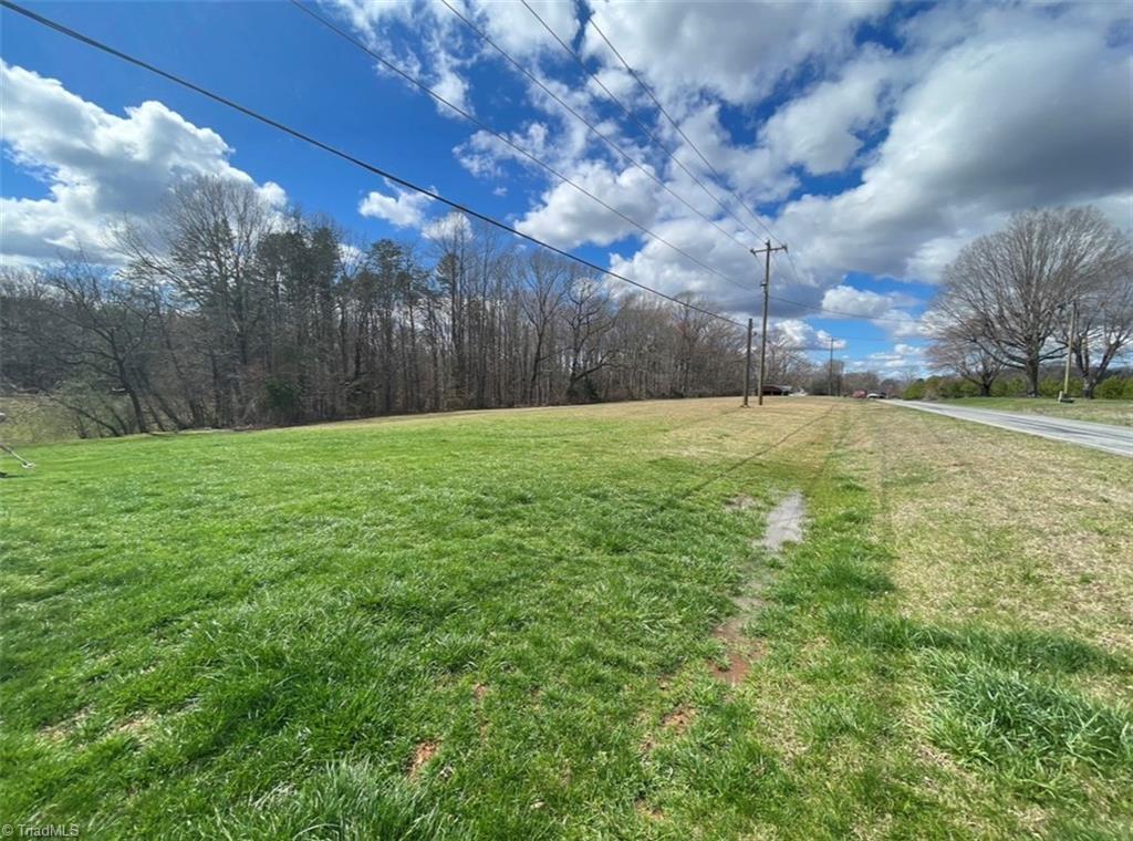 3952 Pride's Road East Bend, NC 27018 - Photo 6 of 26 Side yard/vacant lot