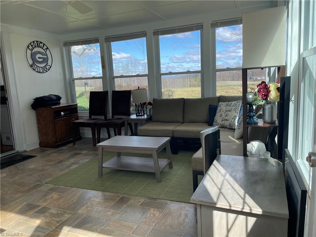 3952 Pride's Road East Bend, NC 27018 - Photo 9 of 26 Sunroom