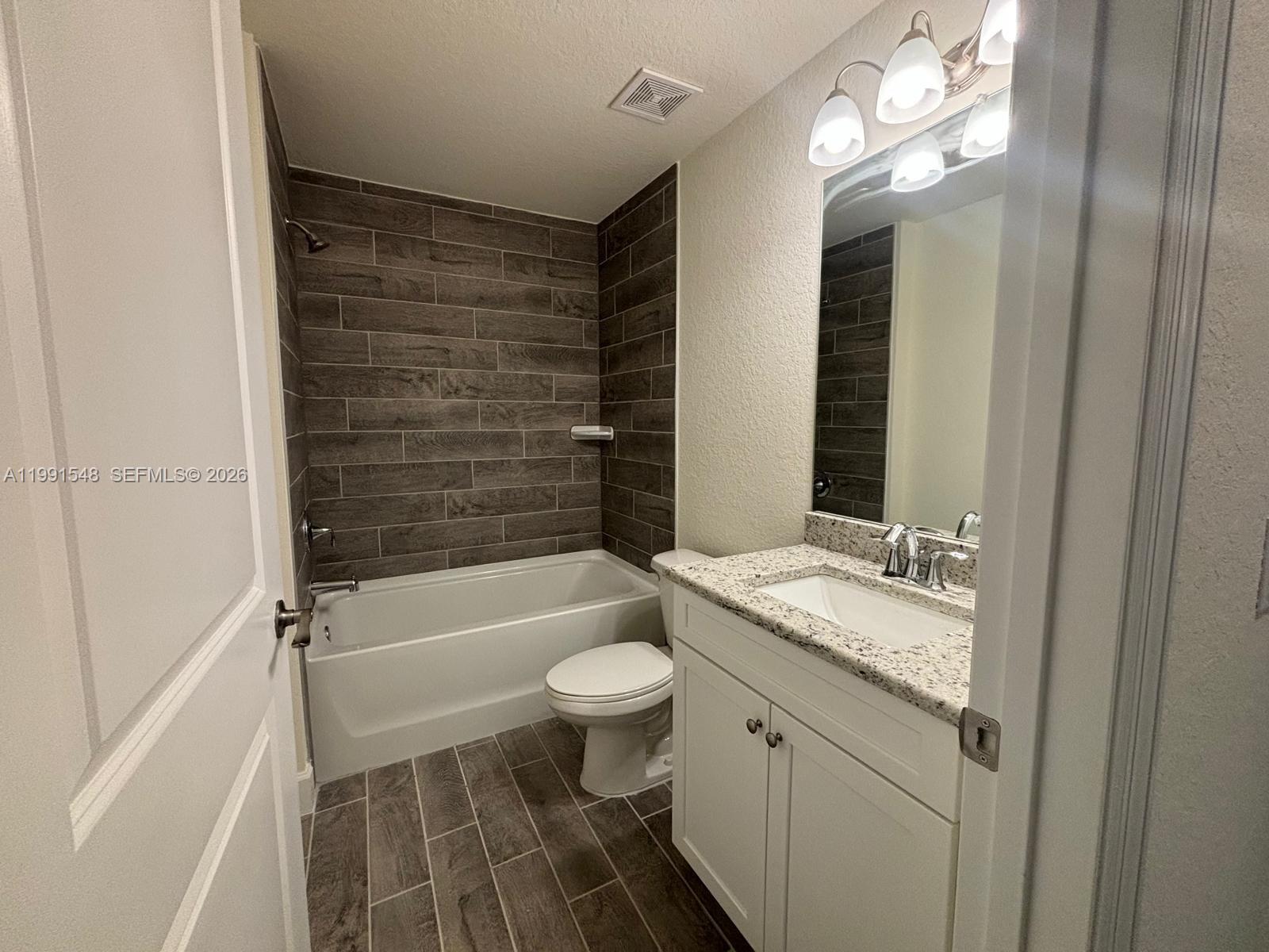 2711 20th Street Southwest Lehigh Acres, FL 33976 - Photo 7 of 11