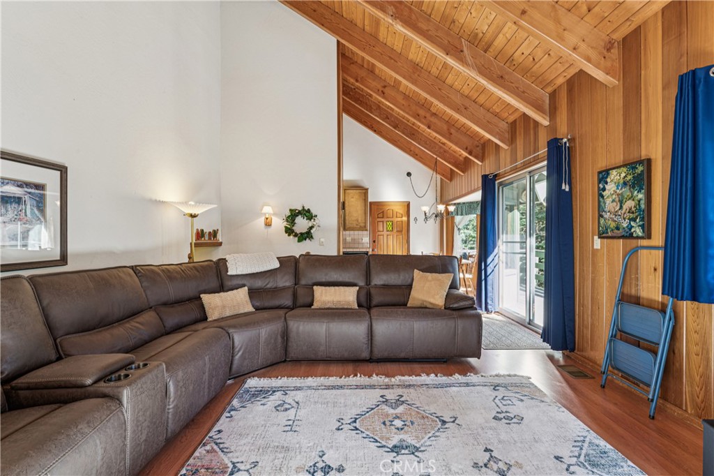 175 Massive Blue Jay, CA 92317 - Photo 31 of 40 a living room with furniture and a rug