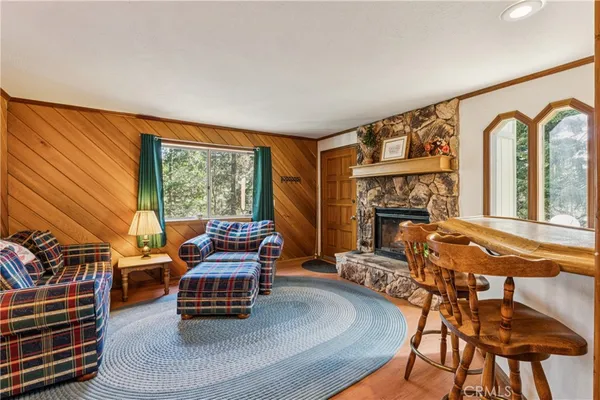 a room with furniture and a large window